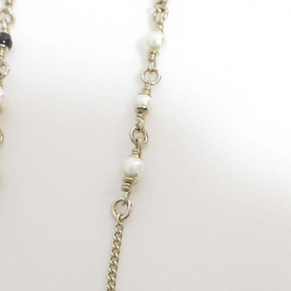 CHANEL Gold Pearl Logo Necklace - Picture 6 of 11